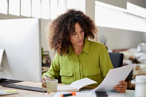 marketer researching recession spending data to understand the impact on consumer spending habits